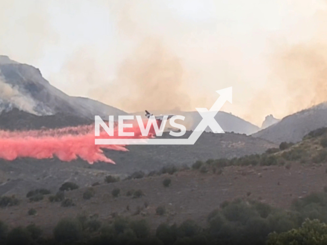 Air tanker battles diamond fire in Tonto national forest, 9% containment achieved. Note: This picture is a screenshot from the video. (InciWeb/Clipzilla)