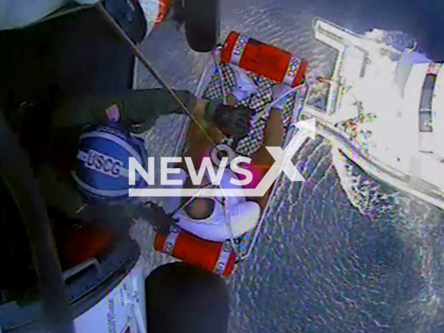 A man was rescued 80 miles off the coast after suffering chest pains at sea near Treasure Island Florida, United States on 2 August 2023. Note: Picture is screenshot from a video. (U.S. Coast Guard/Clipzilla)