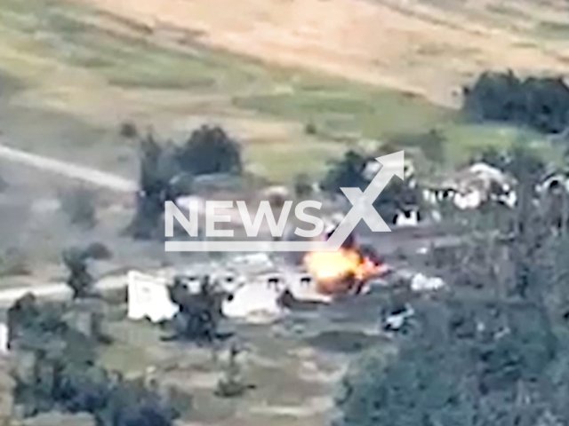 Ukrainian fighters destroy a minibus used by the Russians to transport their personnel in Ukraine in undated footage. The footage was released by Oleksandr Stanislavovych Syrskyi on Wednesday, Aug. 9, 2023. Notes: Photo is screen from a video. (@63ombr/Newsflash)