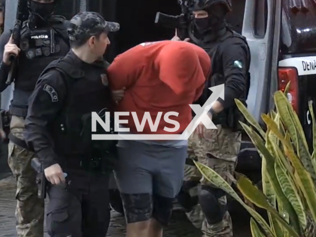 Police arrest  a 26-year-old student in Foz do Iguacu, Brazil, on Wednesday, Aug 9, 2023. He is suspected of using online games to commit sexual abuse against more than 300 children and some teenagers. Note: Picture is screenshot from a video. (Newsflash)