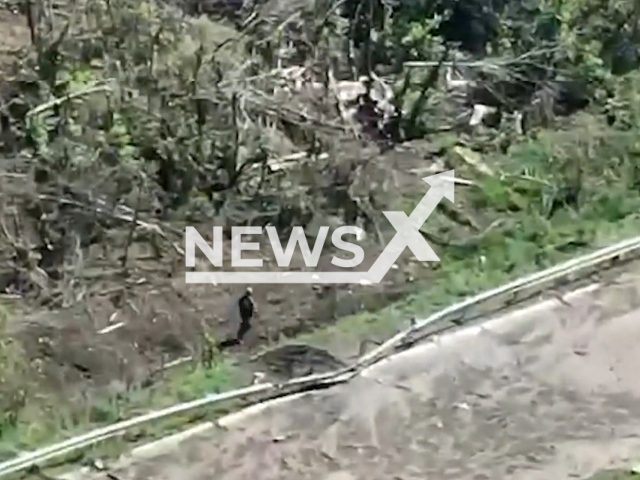 Ukrainian border guards destroy Russian Forest Hideout near Bakhmut in Ukraine in undated footage. The footage was released by the DPSU press service on Friday, Aug. 11, 2023.
Notes: Photo is screen from a video. (@DPSU-communication/Newsflash)