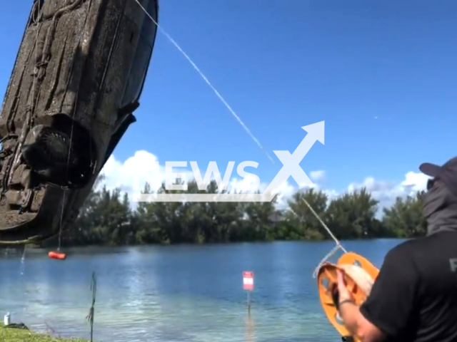 The diving team uncovers 32 submerged vehicles in Doral Lake on the 9th of August 2023. Note: This picture is a screenshot from the video. (Miami-Dade Police Department/Clipzilla)