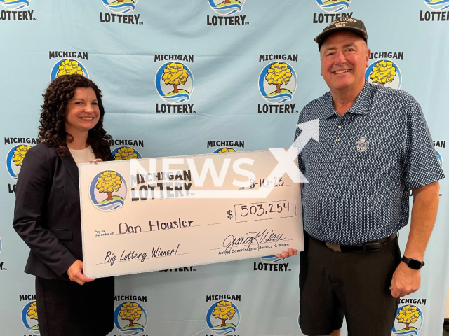 Acting Lottery Commissioner Jessica Weare and lucky winner Dan Housler pose in undated photo. The 62-year-old man from the city of Portage, Michigan State, USA, won USD 503,254 (GBP 396,481) playing Club Keno in August 2023. Note: Licensed content. (Michigan Lottery/Newsflash)