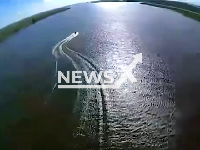 Soldiers of the Special Operations Forces destroy a Russian boat with the help of a drone in Ukraine in undated footage. The footage was released by the 73rd of the Special Purpose Marine Center on Monday, Aug. 14, 2023.
Notes: Photo is screen from a video. (@NavalSOFCenter/Newsflash)