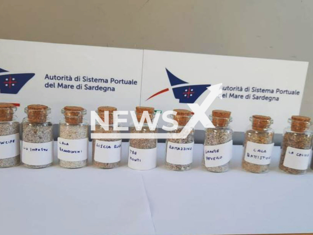 Picture shows the eleven jars with sand and labels indicating as different beaches, undated. During the inspection of passengers embarking from the port of Olbia, Italy,   agents found the jars and fined two Italian tourists, on Monday, Aug.  14, 2023. Note: Private photo. (Newsflash)