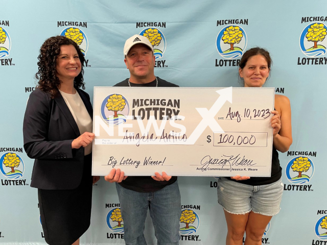 Photo shows Acting Lottery Commissioner Jessica Weare (left) with the winner Angela Antico (right) and her husband Paul (center), undated. The Macomb County woman won $100,000 Club Keno Prize from the Michigan Lottery.
Note: Licensed photo(Michigan Lottery/Newsflash).