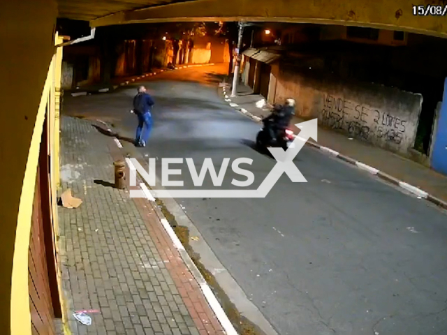 A man avoids at least four shots in Poa, Greater Sao Paulo, Brazil, Tuesday, Aug. 15, 2023. He survived the incident unhurt. Note: Picture is screenshot from a video. (Newsflash)