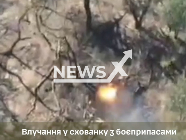 Ukrainian fighters destroy a Russian camouflaged ammunition depot in Ukraine in undated footage. The footage was released by the 31st Separate Mechanized Brigade on Wednesday, Aug. 16, 2023.
 Notes: Photo is screen from a video. (@31ombr/Newsflash)