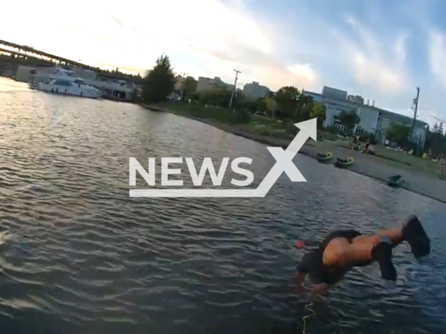 Seattle harbour patrol officers' heroic rescue saves a man from drowning in portage bay on the 12th of August 2023. Note: This picture is a screenshot from the video. (Seattle Police Department/Clipzilla)