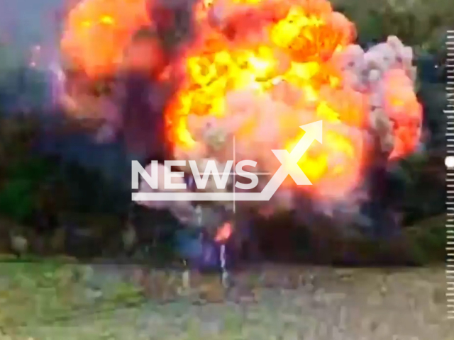 Ukrainian artillery hits a hidden Russian tank causing a fiery explosion in Ukraine in undated footage. The footage was released by the commander of the 103rd Separate Territorial Defense Brigade on Wednesday, Aug. 16, 2023.
Notes: Photo is screen from a video. (@oborona.lviv/Newsflash)