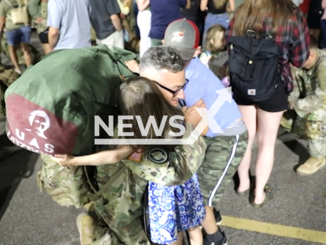 Michigan national guard soldiers return home after a year-long deployment in Syria, reuniting with loved ones in Lansing, Michigan on the 16th of August 2023. Note: This picture is a screenshot from the video. (DVIDS/Clipzilla)