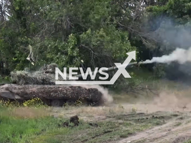 Ukrainian tank hits Russian military positions on the battlefield in Ukraine in undated footage. The footage was released by the 60th separate mechanized Ingulets brigade on Sunday, Aug. 20, 2023.
Notes: Photo is screen from a video. (@60ombr/Newsflash)