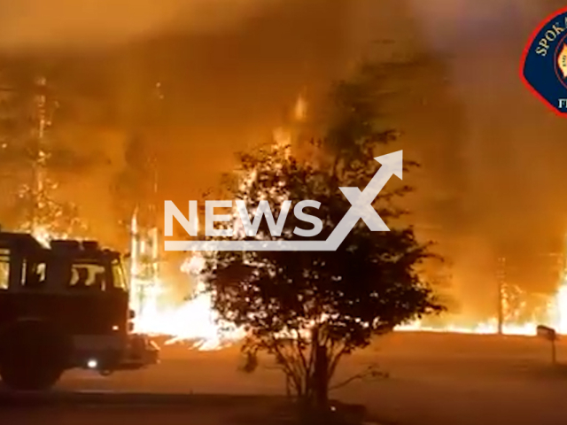 Photo shows the fire in Elk in Spokane County, Washington, United States, Saturday, Aug. 19, 2023. At least two people were killed and dozens of homes have been destroyed during a series of wildfires in eastern Washington, United States.Note: Picture is screenshot from a video. (Spokane Valley Fire Department/Newsflash)