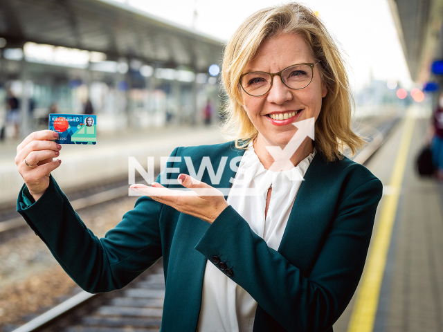 Image shows Austria's Minister of Climate Action, Environment, Energy, Mobility, Innovation and Technology Leonore Gewessler, 45, holding a public transport ticket, undated photo. The country offered free public transport for a year to people willing to get a tattoo reading 'Klimaticket'. Note: Licensed content. (Ministry of Climate Action, Environment, Energy, Mobility, Innovation and Technology/Newsflash)