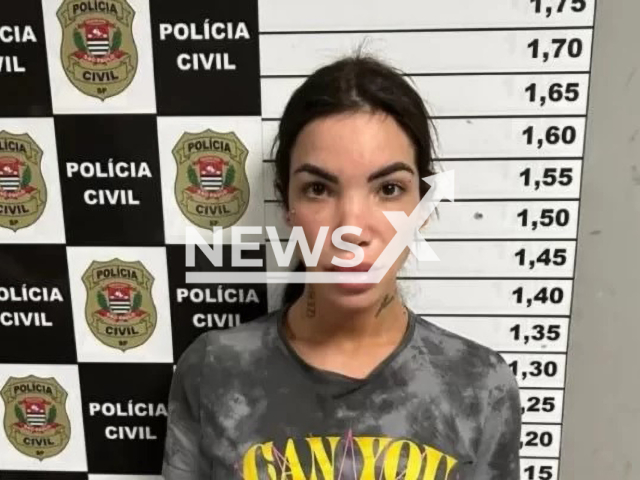 Vitória Guarizo Demito, 25, poses in undated photo. She was arrested on suspicion of torture and theft from a man in Moema, South Zone of São Paulo, Brazil. Note: Police photo. (Policia Civil/Newsflash)