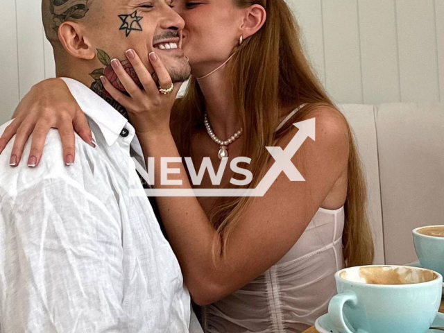 Elizaveta Vasilenko, 25, kisses her boyfriend Russian rapper Alisher Morgenshtern, undated. She is Ukrainian actress, OnlyFans model, video blogger and TikToker. Note: Private photo. (@elizabethvasilenko/Newsflash)