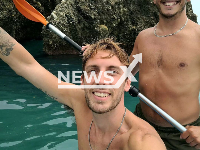 Maxi Ludvik, 29, (front) and Emmanuel Soria, 34, (behind) pose in undated photo. Both have disappeared after going out to practice a paddle surfing in Malaga, Spain. Note: Private photo. (@maxiludvik_/Newsflash)