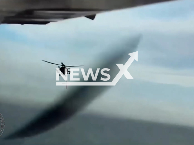 Russian helicopter fires at the Ukrainian drone during an air chase in Tarkhankut Peninsula in Crimea in the occupied part of Ukraine in undated footage. The footage was released by the Main Intelligence Directorate of the Ministry of Defense of Ukraine on Friday, Sep. 01, 2023.
 Note: Photo is screen from a video. (@DI_Ukraine/Newsflash)