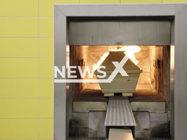 Image shows a cremation process, undated photo. Crematoria in Switzerland reportedly collet dental gold from the deceased without their families' knowledge. Note: Photo is a screenshot from a video. (Newsflash)