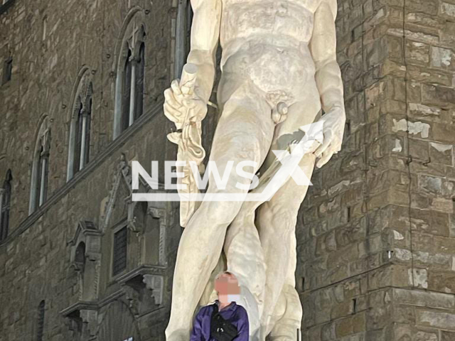 Photo shows the German tourist that climbed the fountain of Neptune in Florence. The tourist, 22, damaged a horse's foot.
Note: Licensed photo(@DarioNardella/Clipzilla).