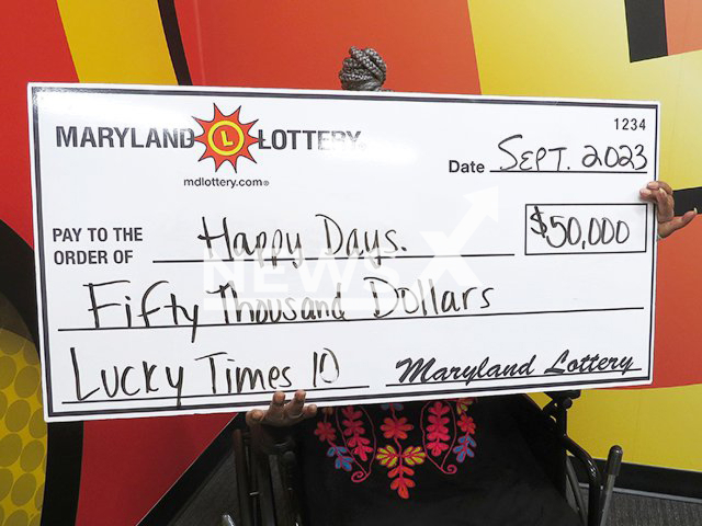 Image shows winner named 'Happy Days', aged 80, in undated photo. The lucky woman from Washington D.C., USA, won USD 50,000 (GBP 40,120) on the lottery. Note: Licensed content. (Maryland Lottery/Newsflash)