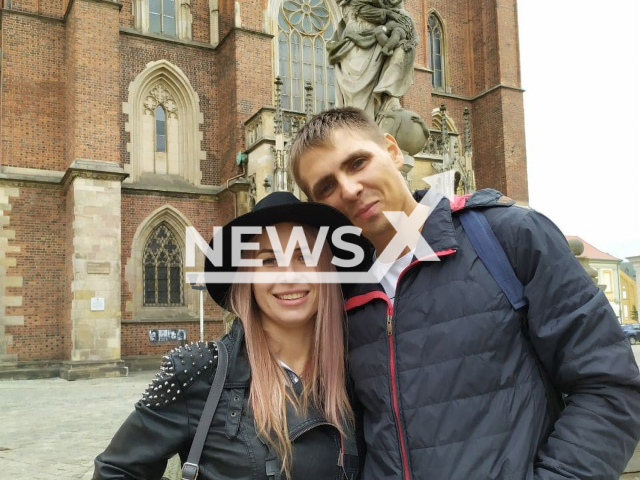 Picture shows Julia, 34, and Valery Chumak, 38, undated. They tragically died while rescuing dog from cesspool on their yard. Note: Private photo. (Julia Chumak/Newsflash)