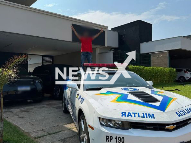 Picture shows a man posing with the Camaro transformed into a vehicle, undated. A court ordered the police  to return the Camaro to the former owner, a businessman  investigated and accused of drug trafficking, after it was used by police  Porto Velho, Brazil, since April 2020. Note: Private photo (Newsflash)