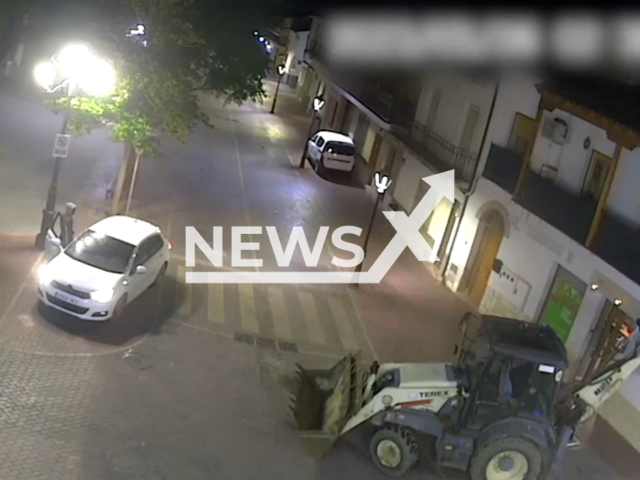 Suspects use an excavator to rob an ATM in Toledo, Spain, undated.  Five members of a criminal group were arrested  for robing two banks with an excavator and for robbing homes. Note: Picture is screenshot from a video. (Newsflash)