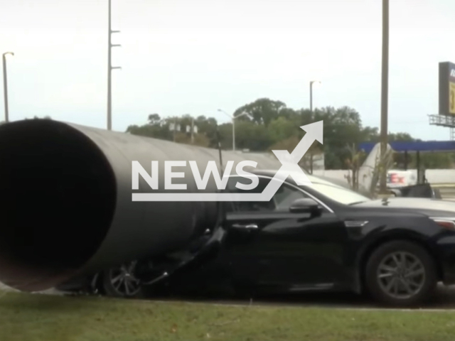 Photo shows the scene after a Taco Bell sign fell on a driver's car in Crowley, Louisiana, USA, undated. The driver was injured. Note: Picture is a screenshot from a video (Newsflash)