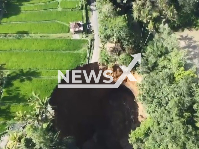 Picture shows the giant sinkhole that appeared in Gianyar, Indonesia, undated. It reportedly has a depth of 70 meters. Note: Private photo. (Newsflash)