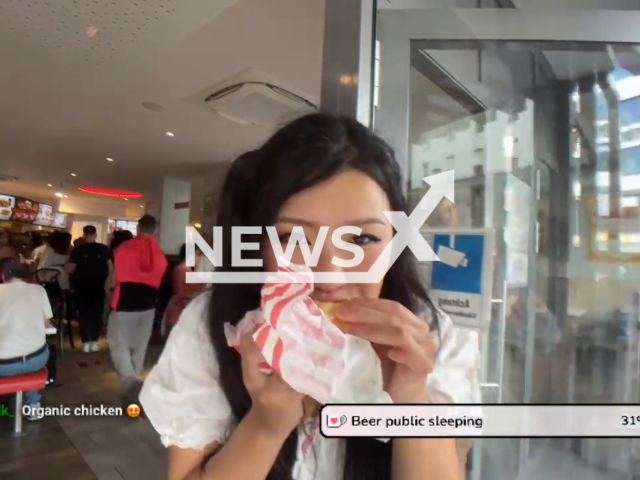 Image shows Twitch streamer Hazu, who goes by 'hazunats', undated photo. She discovered a ball of paper in her KFC meal in the city of Munich, Germany. Note: Photo is a screenshot from a video. (Newsflash)