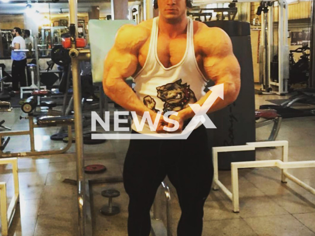 Omid Hatami, 28, (pictured) a bodybuilding champion and sports coach, was found dead by police in his house in Tehranpars, Iran on 14th April 2022. Note: Private picture (@omidhatami_ifbb/Newsflash)