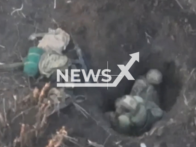 Russian artillerymen aim at Ukrainian soldiers hiding in foxholes near Klishchiivka in Bakhmut Raion, Ukraine in undated footage. The footage was released by the Russian MoD on Thursday Sep. 28, 2023. Note: Picture is screenshot from a video. (Russian Ministry of Defence/Newsflash)