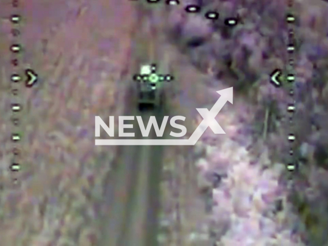 Ukrainian kamikaze drone flies to destroy Russian Kamaz in Ukraine in undated footage. The footage was released by the 103rd Separate Territorial Defence Brigade on Wednesday, Sep. 27, 2023.  Note: Picture is screenshot from a video. (@oborona.lviv/Newsflash)