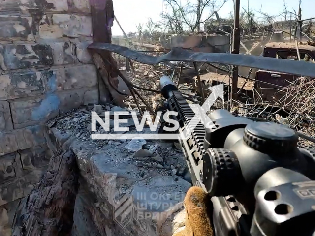 POV footage shows Ukrainian soldiers In close combat clearing destroyed Andriivka in Donetsk Oblast, eastern Ukraine in undated footage. The footage was released by the 3rd separate assault brigade on Thursday, Sep. 28, 2023.Note: Picture is screenshot from a video. (@ab3army/Newsflash)