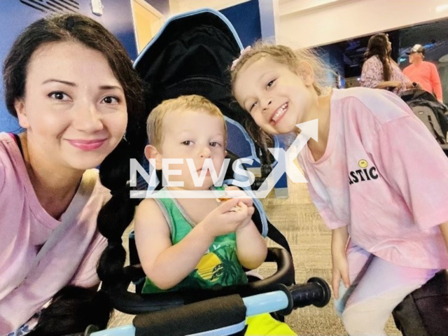 Nancy Johnson poses with her children, undated. She died by suicide after drowning her kids in  Semmes, Alabama. Note: Private photo. (Newsflash)