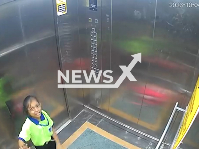 A girl screams and cries for help after getting stuck in a lift inside an apartment complex in Gaurabagh area of Lucknow, Uttar Pradesh, India, Wednesday, Oct 4, 2023. She was reportedly rescued after 20 minutes. Note: Picture is screenshot from a video. (Newsflash)