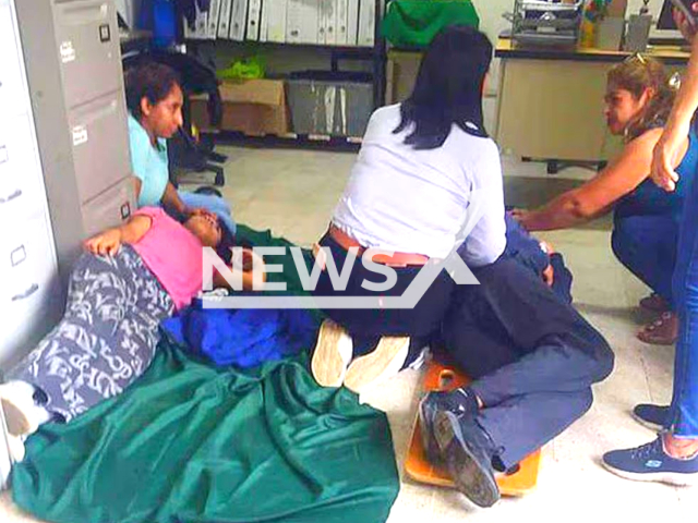 Picture shows staff helping a student, at the Conalep, Campus 103  in Atoyac, Mexico, on Monday, Oct.  2, 2023. Approximately 15 high school students were intoxicated after consuming brownies that were allegedly prepared with marijuana, they had to be transferred to hospital.
Note: Private photo. (Newsflash)