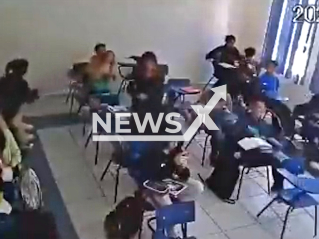 A student tries to choke another student in a high school in Pachuca, Hidalgo, Mexico, undated. The student reportedly received a 10-day suspension from the school. Note: Picture is screenshot from a video. (Newsflash)