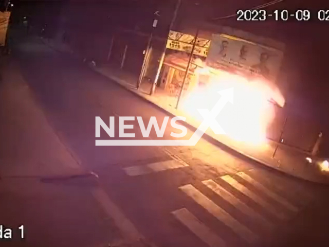 A man sets himself ablaze while trying to burn a building in Moron, Buenos Aires, Argentina, undated. The man managed to put the fire down, after which he fled the scene.Note: Picture is screenshot from a video. (Newsflash)