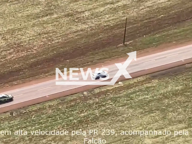 A 20-year-old man is chased by helicopter and police vehicles, in Toledo, Brazil, on Sunday, Oct. 15, 2023. He  crashed and was arrested with he had 400 kilograms of marijuana. Note: Picture is screenshot from a video. (BPMOA, PMPR/Newsflash)