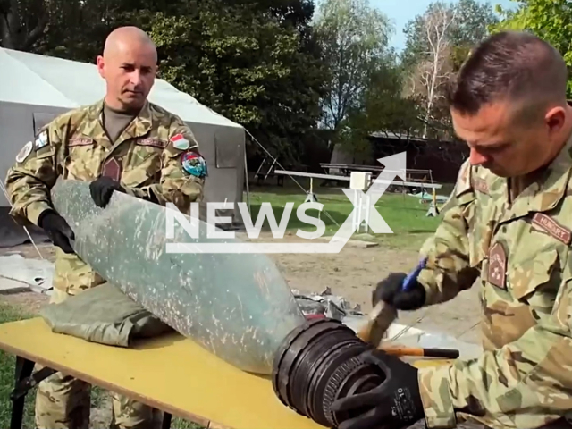 Picture shows   members of the army recovering parts of the plane,  into Lake Balaton, Hungary, on Oct. 10, 2023.  Experts recovered a fighter aircraft that crashed during World War II. Note: Picture is screenshot from a video. (Hungarian Defence Force/Newsflash)