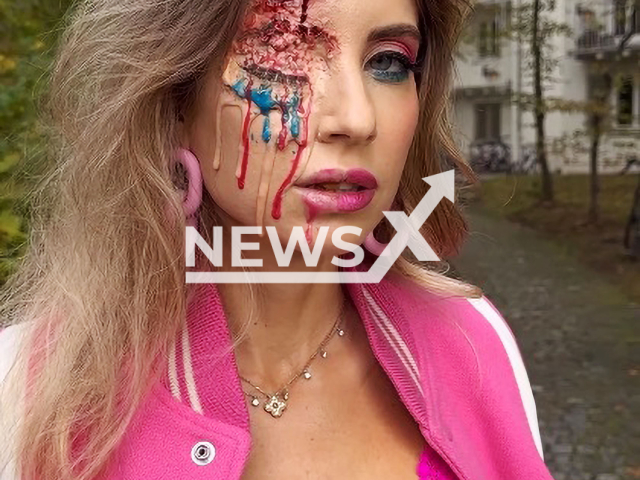 Image shows Cathy Fischer, ex Hummels, aged 35, undated photo. She showed her Instagram fans her Halloween mask. Note: Photo is a screenshot from a video. (Newsflash)