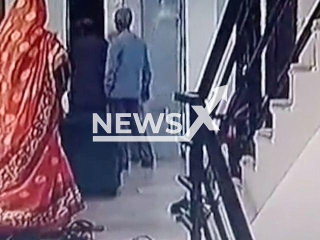 An elderly steps into the air through the door of a lift in Ranchi, India, undated. He fell four levels into the basement as the platform of the lift did not arrive.  Note: Picture is screenshot from a video. (Newsflash)