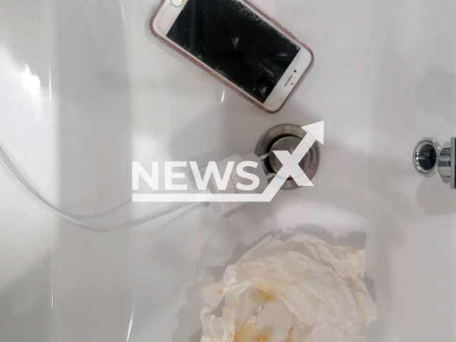 Photo shows a mobile phone, undated. A ten-year-old girl dropped her phone into the bathtub and died from an electric shock in Achinsk in Krasnoyarsk Krai, Russia. Note: Licensed photo (@krksledkom/Newsflash)