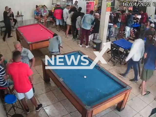 A man is killed with a shotgun in the head inside a bar in Ribeirao das Neves, Brazil, on 16th April. Note: Picture is a screenshot from a video (Newsflash)