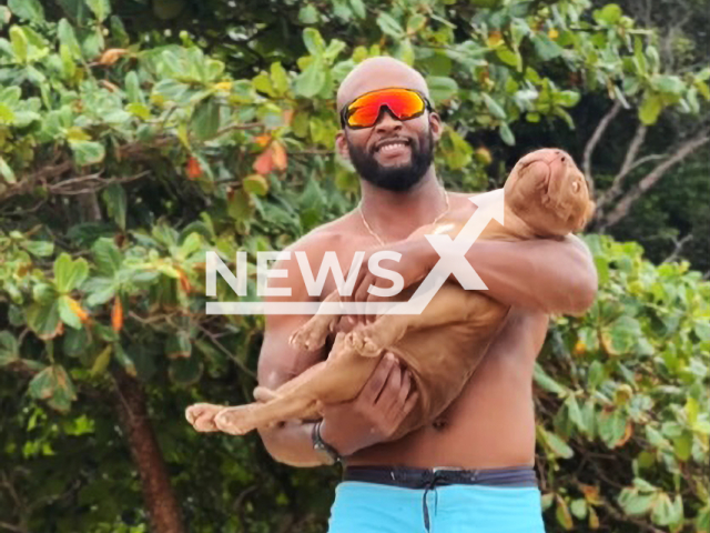 Picture shows Gideone Felix, 40, with his pet, undated. He died in a traffic accident in Itapebi, Brazil, on Saturday, Nov. 18, 2023.    Note: Photo is a screenshot from video. (@bigmonsterofc/Newsflash)