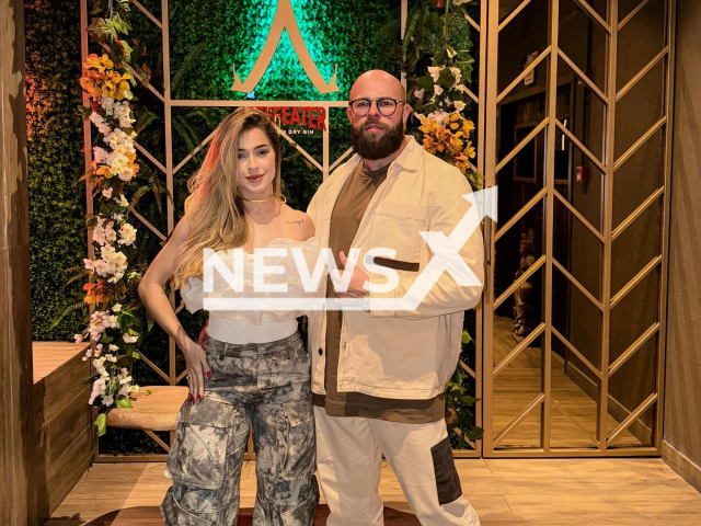 Henrick Cunha poses with Gabrielle Santana in undated photo. They were arrested on suspicion of carrying out a million-dollar scam by selling courses and investments on the internet. Note: Private photo. (@ohenrickcunha/Newsflash)