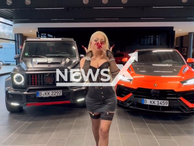 Katja Krasavice shows off her new cars, undated. She reportedly said she was an an extreme SUV fan. Note: Image is a screenshot from video. (@katjakrasavice/Newsflash)