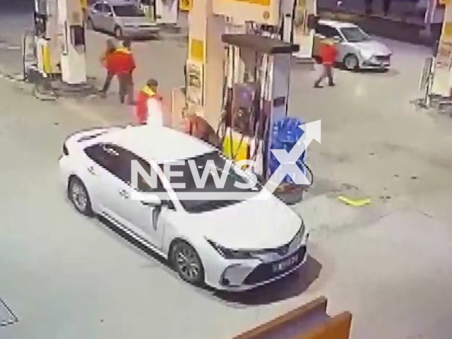 A car catches fire at a petrol station in Erzincan, Turkey, undated. Lokman Yeniceri took his daughter and ran away from the car as soon as the car caught fire. Note: Picture is screenshot from a video. (Newsflash)